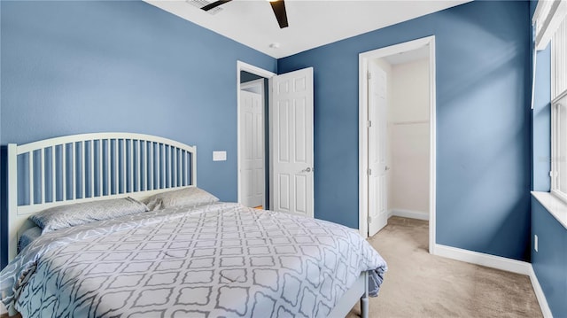 5016 W Lancaster St Unit 00, Tampa, FL 33616 - carpeted bedroom featuring baseboards and a ceiling fan