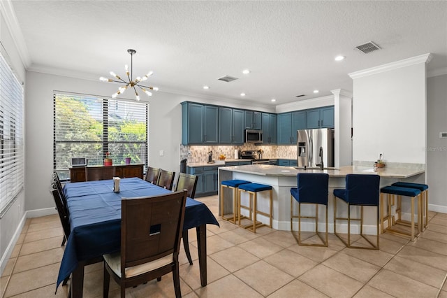 1716 Wild Indigo Ter, Oviedo, FL 32766 - dining room with crown molding, a chandelier, recessed lighting, light tile patterned floors, and a textured ceiling