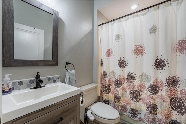 1716 Wild Indigo Ter, Oviedo, FL 32766 - bathroom featuring toilet, vanity, and a shower with shower curtain