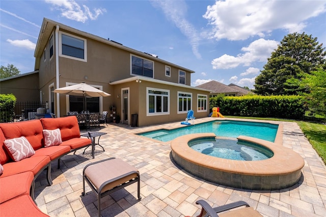 1716 Wild Indigo Ter, Oviedo, FL 32766 - view of pool with a patio, an outdoor living space, a pool with connected hot tub, and outdoor dining space