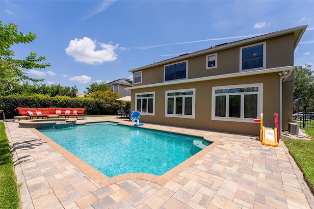 1716 Wild Indigo Ter, Oviedo, FL 32766 - view of pool with a patio, outdoor lounge area, central air condition unit, and a pool with connected hot tub