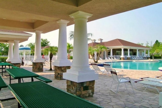 1716 Wild Indigo Ter, Oviedo, FL 32766 - community pool featuring a patio area