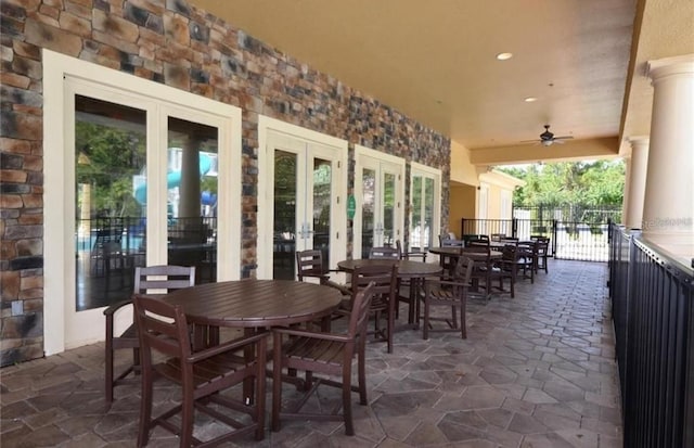 1716 Wild Indigo Ter, Oviedo, FL 32766 - view of patio featuring french doors, outdoor dining space, and a ceiling fan