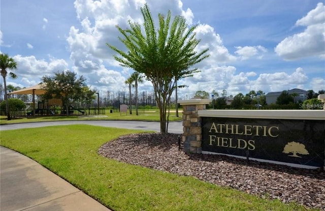 1716 Wild Indigo Ter, Oviedo, FL 32766 - community / neighborhood sign featuring a lawn