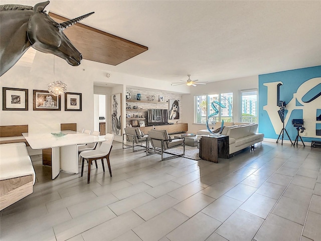 100 S Eola Dr Unit 611, Orlando, FL 32801 - living room featuring a ceiling fan and tile patterned floors