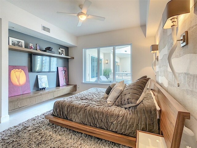 100 S Eola Dr Unit 611, Orlando, FL 32801 - bedroom featuring a ceiling fan