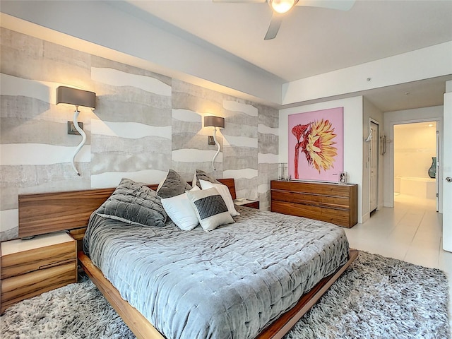 100 S Eola Dr Unit 611, Orlando, FL 32801 - bedroom featuring tile walls and ceiling fan