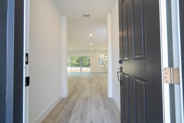 509 St Johns Ct, Poinciana, FL 34759 - foyer entrance featuring light wood-style flooring, baseboards, and recessed lighting