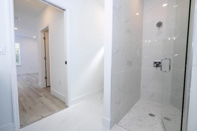 509 St Johns Ct, Poinciana, FL 34759 - full bathroom featuring a marble finish shower and baseboards