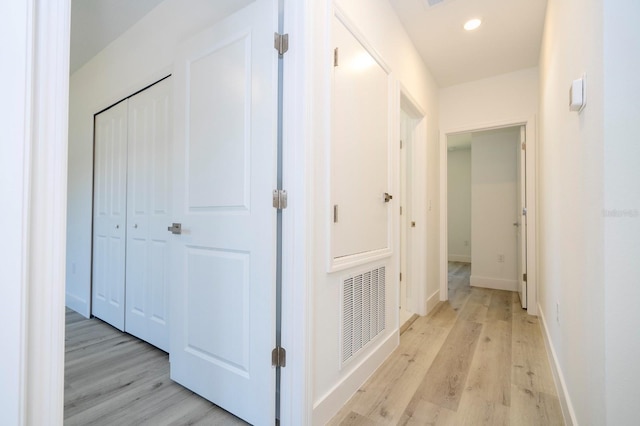 509 St Johns Ct, Poinciana, FL 34759 - hall featuring light wood finished floors, baseboards, and recessed lighting