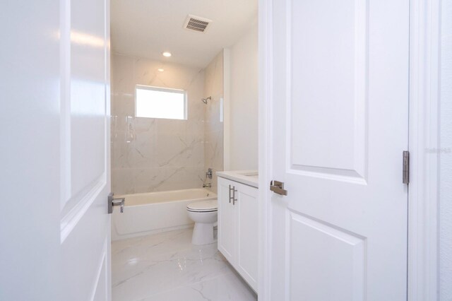 509 St Johns Ct, Poinciana, FL 34759 - full bath with shower / washtub combination, vanity, toilet, marble finish flooring, and recessed lighting