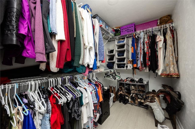 3832 NW 27th St, Gainesville, FL 32605 - walk in closet featuring wood finished floors