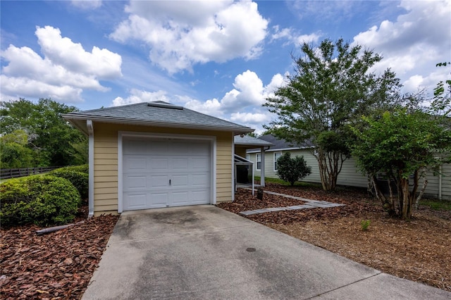 3832 NW 27th St, Gainesville, FL 32605 - view of front of house featuring driveway, a garage, and an outdoor structure