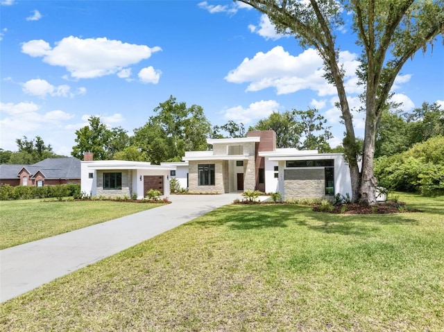 7615 SE 12th Cir, Ocala, FL 34480 - contemporary home featuring stone siding, concrete driveway, a chimney, a front yard, and stucco siding