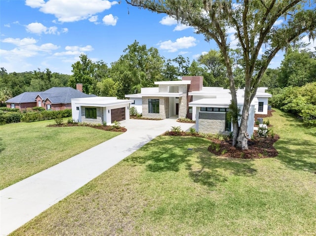 7615 SE 12th Cir, Ocala, FL 34480 - contemporary house with concrete driveway, stone siding, a garage, and a front yard