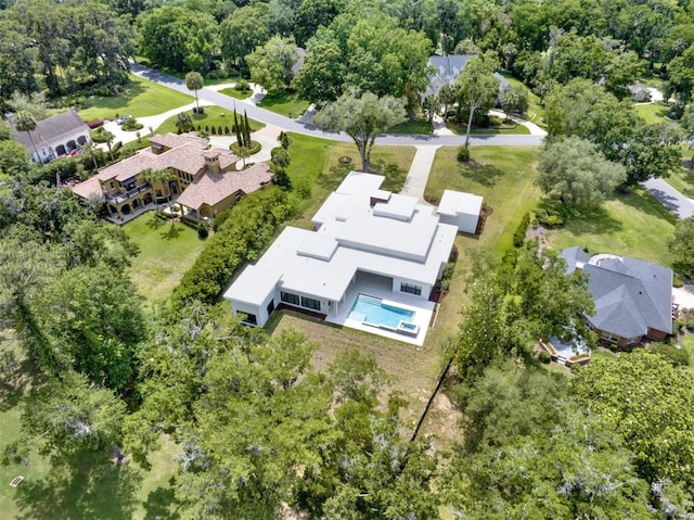7615 SE 12th Cir, Ocala, FL 34480 - aerial perspective of suburban area with a pool area