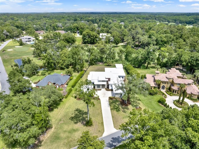 7615 SE 12th Cir, Ocala, FL 34480 - aerial perspective of suburban area featuring a forest