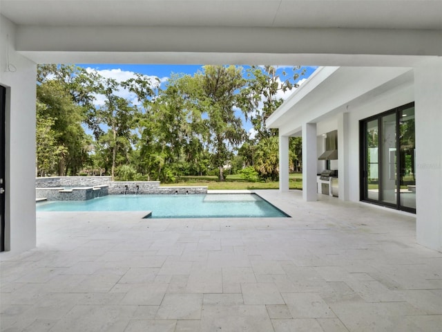 7615 SE 12th Cir, Ocala, FL 34480 - view of pool with a patio area, a pool with connected hot tub, and a grill