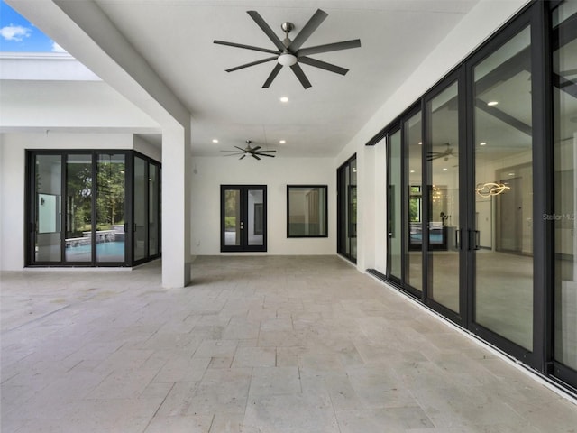 7615 SE 12th Cir, Ocala, FL 34480 - view of patio with ceiling fan and french doors