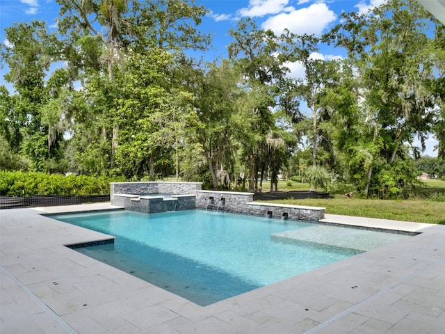 7615 SE 12th Cir, Ocala, FL 34480 - swimming pool featuring view of scattered trees and a patio area