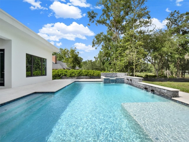 7615 SE 12th Cir, Ocala, FL 34480 - outdoor pool with a jacuzzi and a patio
