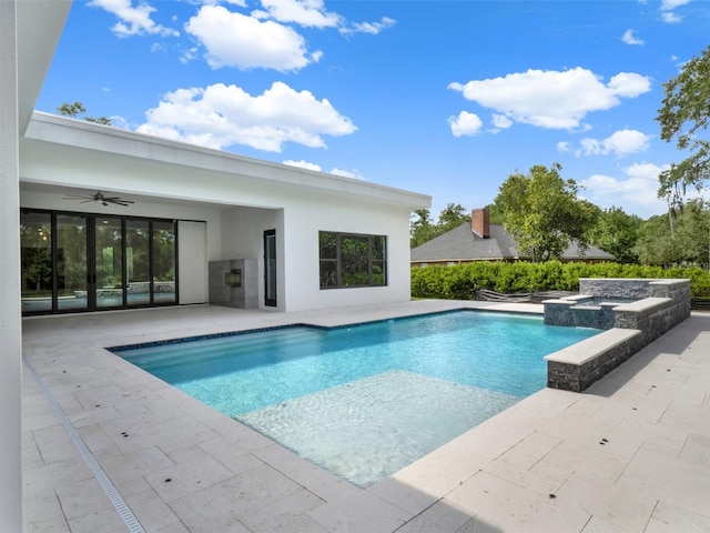 7615 SE 12th Cir, Ocala, FL 34480 - view of pool featuring a patio area, a ceiling fan, and a pool with connected hot tub