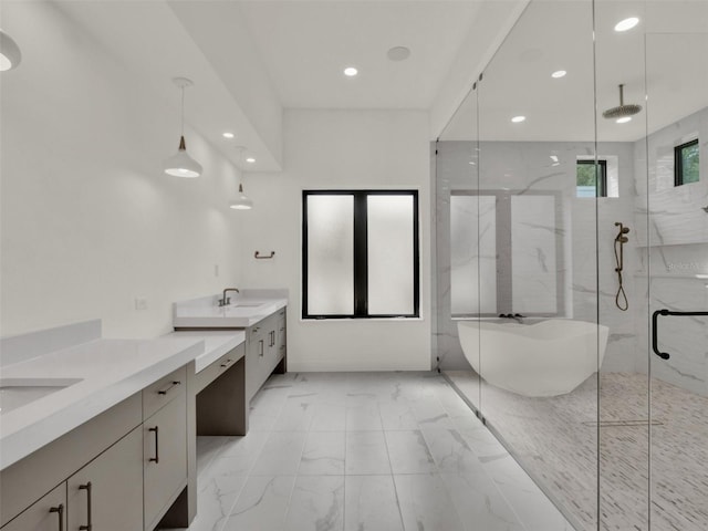 7615 SE 12th Cir, Ocala, FL 34480 - full bathroom with a marble finish shower, two vanities, a freestanding tub, recessed lighting, and marble finish floors