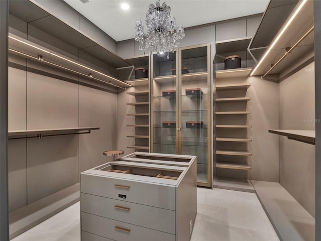 7615 SE 12th Cir, Ocala, FL 34480 - walk in closet featuring a chandelier