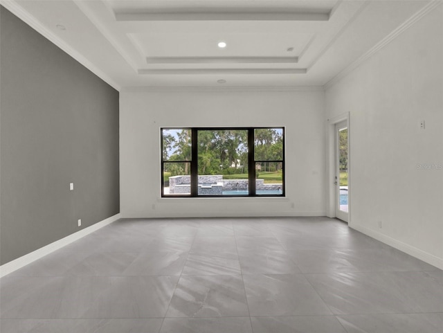 7615 SE 12th Cir, Ocala, FL 34480 - empty room featuring a raised ceiling, plenty of natural light, and ornamental molding