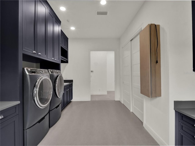 7615 SE 12th Cir, Ocala, FL 34480 - washroom with washing machine and clothes dryer, cabinet space, recessed lighting, and baseboards