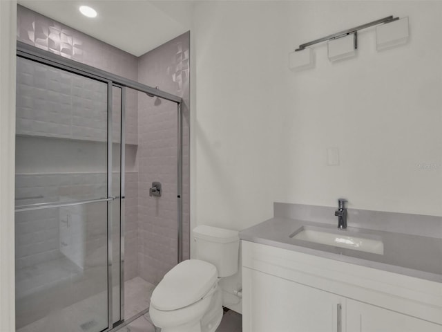 7615 SE 12th Cir, Ocala, FL 34480 - full bath with toilet, a stall shower, vanity, and recessed lighting