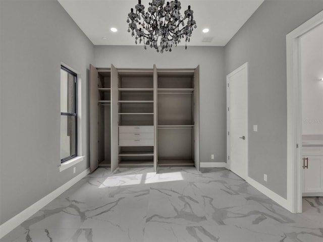 7615 SE 12th Cir, Ocala, FL 34480 - unfurnished bedroom featuring marble finish floors, baseboards, a chandelier, and recessed lighting