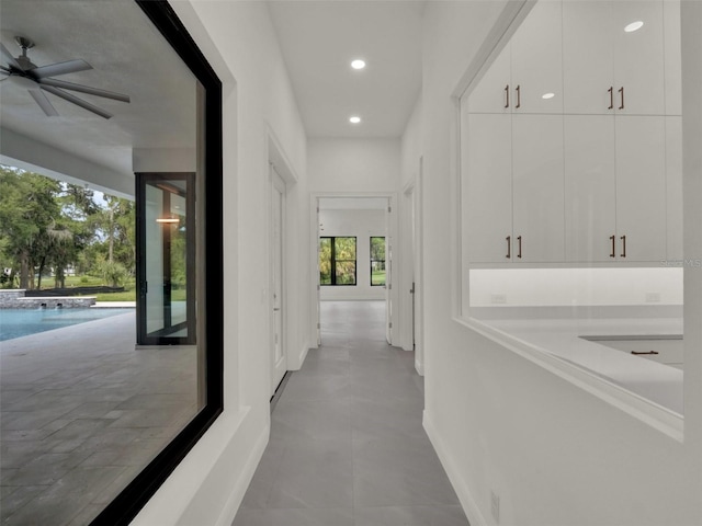 7615 SE 12th Cir, Ocala, FL 34480 - hallway featuring recessed lighting and baseboards