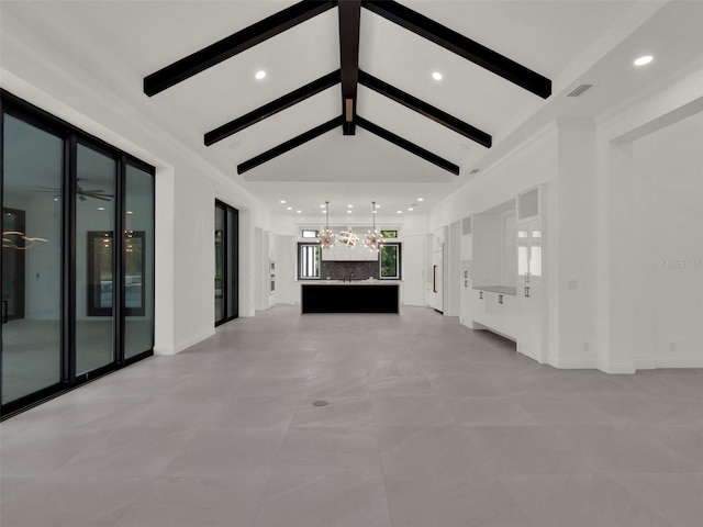 7615 SE 12th Cir, Ocala, FL 34480 - unfurnished living room featuring a chandelier and recessed lighting