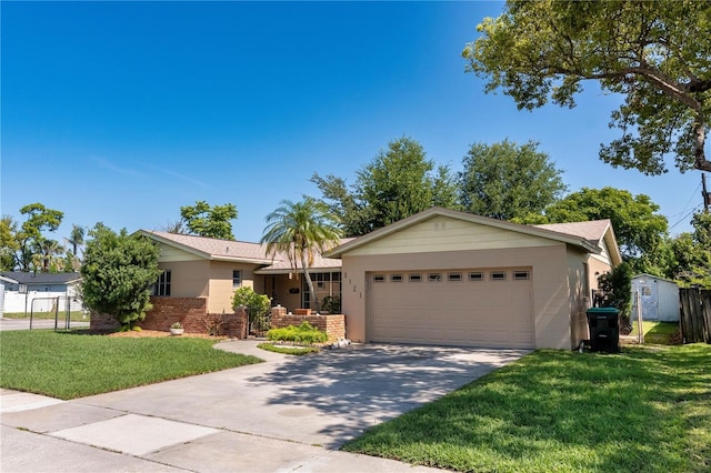 3121 Thistlehill Dr, Winter Park, FL 32792 - ranch-style home with a garage, driveway, and brick siding
