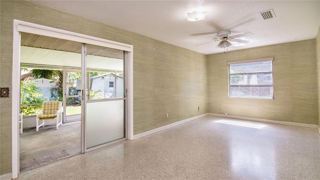3121 Thistlehill Dr, Winter Park, FL 32792 - empty room featuring speckle patterned floor, ceiling fan, and baseboards