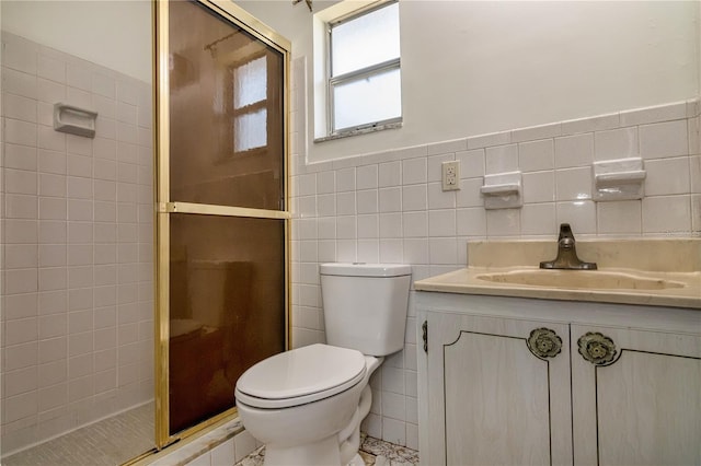 3121 Thistlehill Dr, Winter Park, FL 32792 - bathroom featuring tile walls, toilet, a shower stall, vanity, and wainscoting