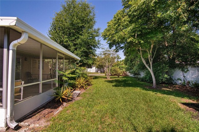 3121 Thistlehill Dr, Winter Park, FL 32792 - view of yard with a sunroom