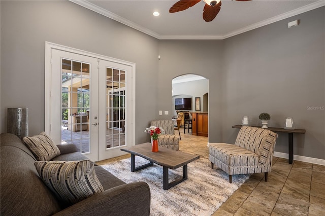 8475 Eagles Loop Cir, Windermere, FL 34786 - living room with french doors, a ceiling fan, arched walkways, crown molding, and stone tile flooring