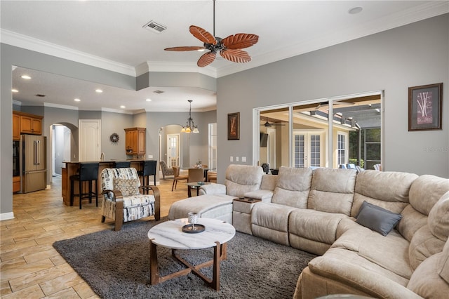 8475 Eagles Loop Cir, Windermere, FL 34786 - living area featuring arched walkways, ceiling fan, crown molding, recessed lighting, and baseboards