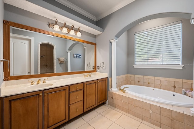 8475 Eagles Loop Cir, Windermere, FL 34786 - bathroom with a bath, double vanity, tile patterned floors, ornate columns, and ornamental molding
