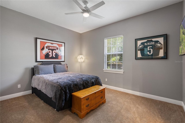8475 Eagles Loop Cir, Windermere, FL 34786 - bedroom with light colored carpet, baseboards, and ceiling fan