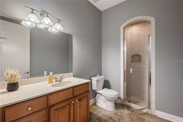 8475 Eagles Loop Cir, Windermere, FL 34786 - bathroom with toilet, vanity, baseboards, a stall shower, and tile patterned flooring