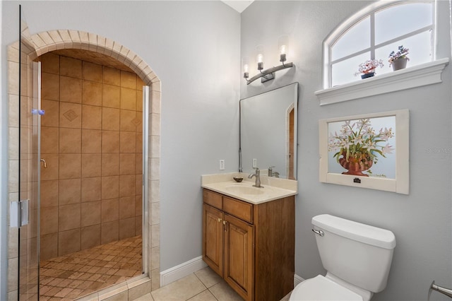 8475 Eagles Loop Cir, Windermere, FL 34786 - bathroom with vanity, toilet, tile patterned flooring, and a shower stall
