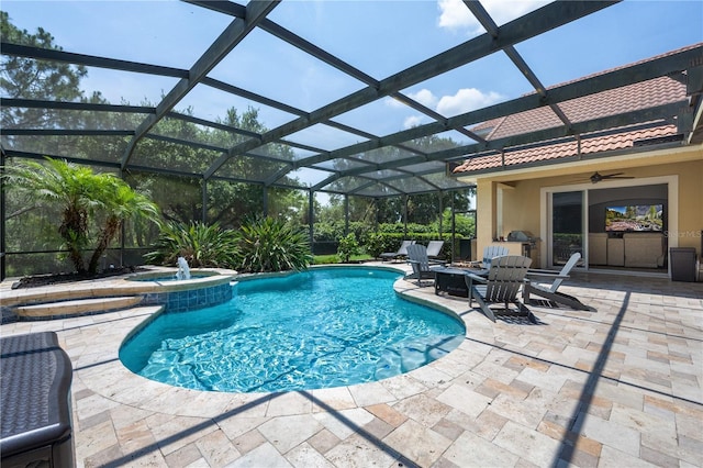 8475 Eagles Loop Cir, Windermere, FL 34786 - view of swimming pool with a ceiling fan, a patio, glass enclosure, a pool with connected hot tub, and an outdoor fire pit