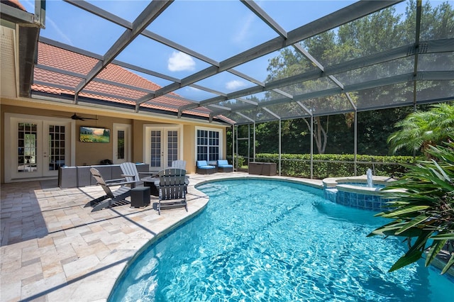8475 Eagles Loop Cir, Windermere, FL 34786 - view of swimming pool featuring french doors, a patio area, a pool with connected hot tub, glass enclosure, and ceiling fan