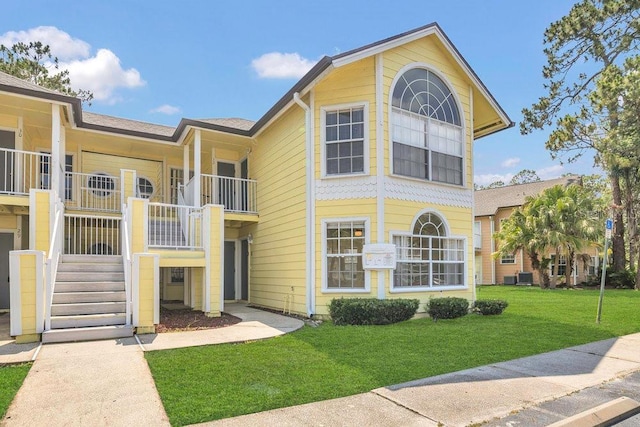2040 Royal Bay Blvd Unit 31, Kissimmee, FL 34746 - view of property featuring stairs