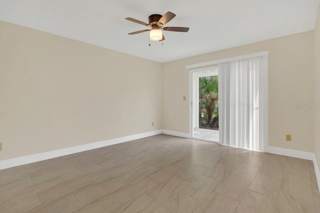 2040 Royal Bay Blvd Unit 31, Kissimmee, FL 34746 - spare room featuring ceiling fan and baseboards
