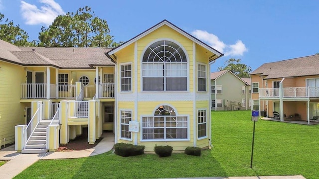 2040 Royal Bay Blvd Unit 31, Kissimmee, FL 34746 - view of property featuring stairway