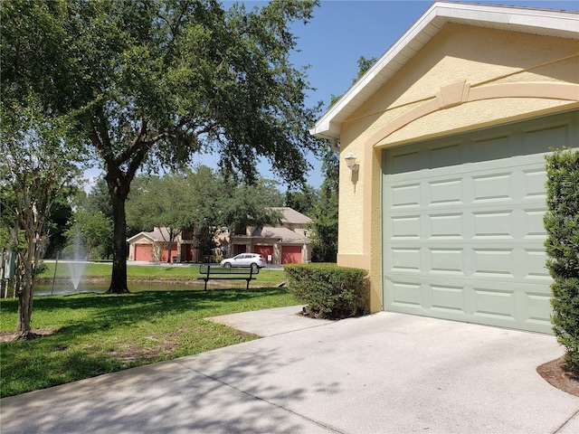 3658 Oakdale Cir Unit 100, Oviedo, FL 32765 - garage with concrete driveway